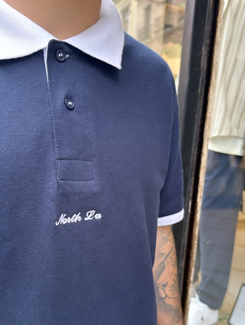 POLO NORTH LA MARINO y BLANCO