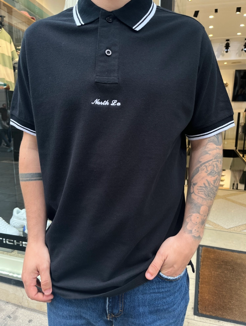 POLO NORTH LA NEGRO y BLANCO
